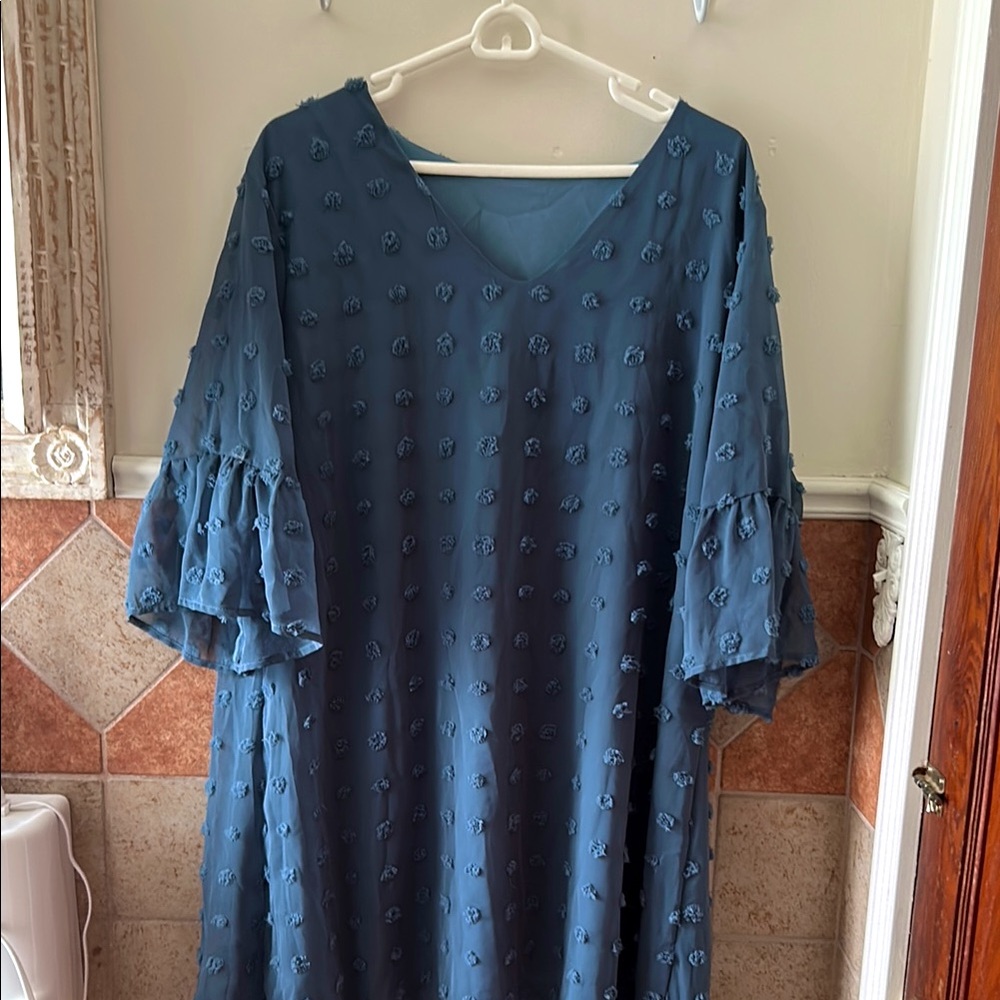 Blue tufted dot dress with ruffled sleeves
